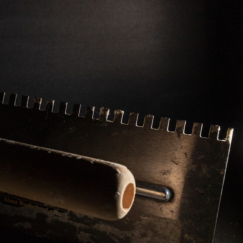 Detail of a trowel edge over a coated wall