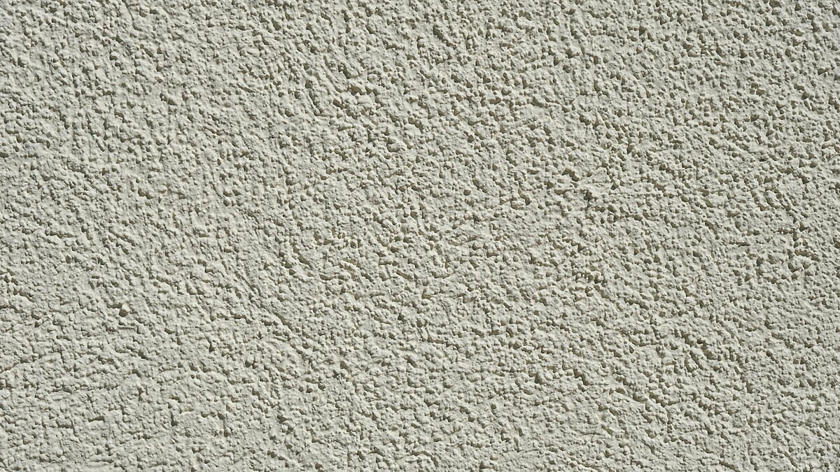 Smooth skim-coated drywall surface finished flat and ready for mist-coat painting